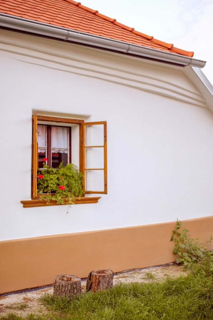 House with a patio area suited to pressure washing